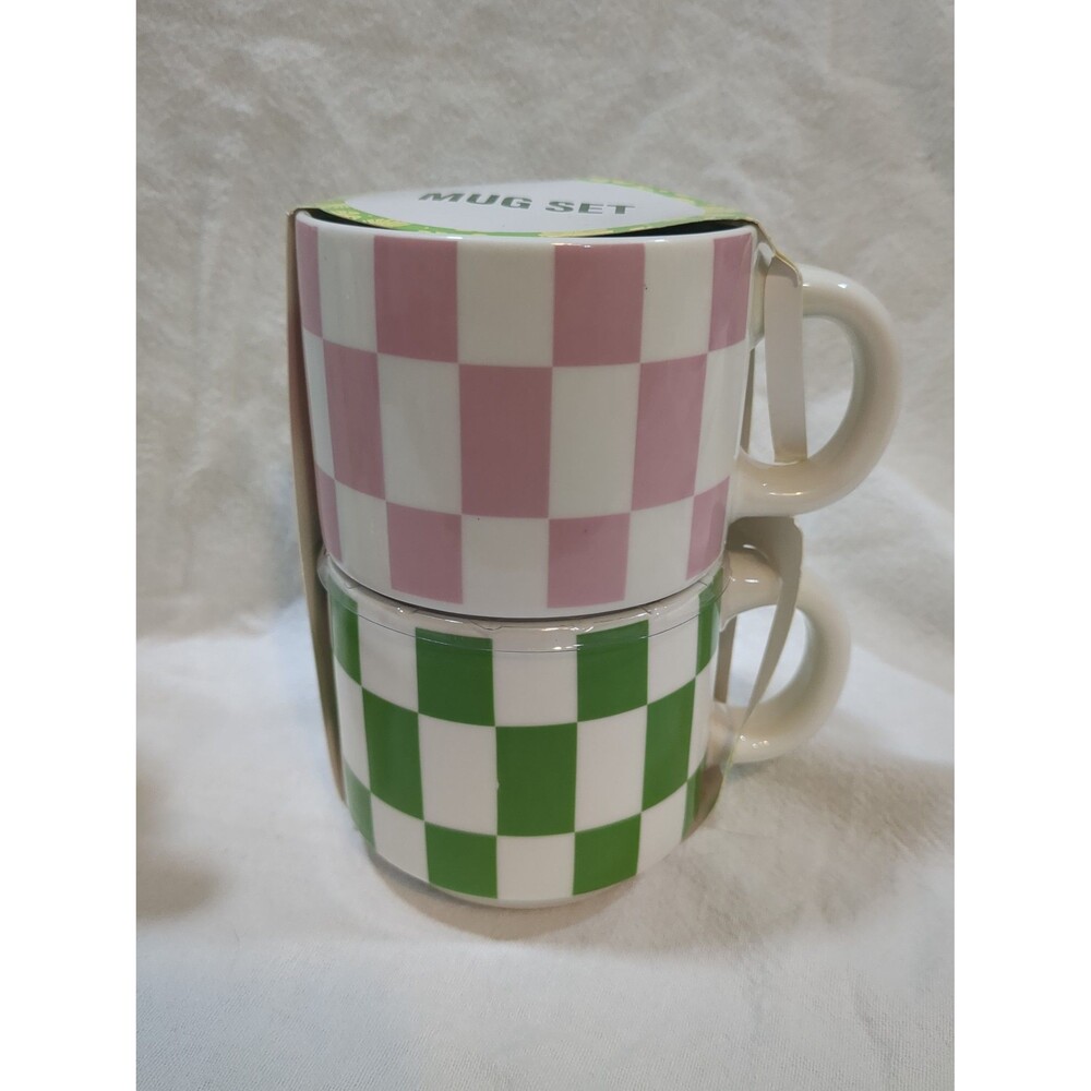 Set of two new checkered coffee cups. Pink green fall winter coffee tea cocoa
